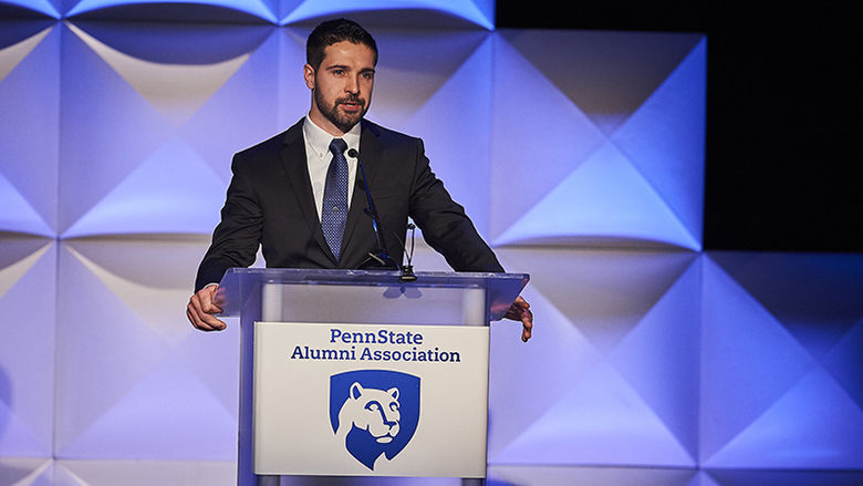 Donald J. Cella accepts the Penn State Alumni Association Alumni Achievement Award
