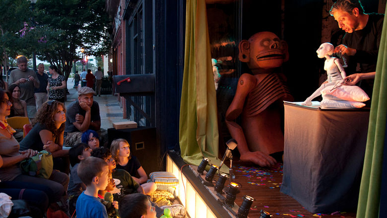 Faculty member Laurencio Carlos Ruiz presents puppet show