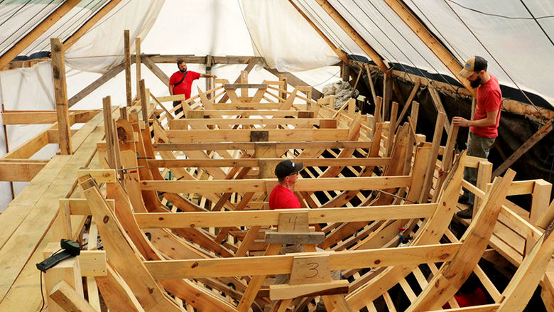 Alix, Steve, and their crew work on the boat