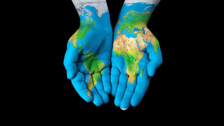 Hands painted to look like a map of the world