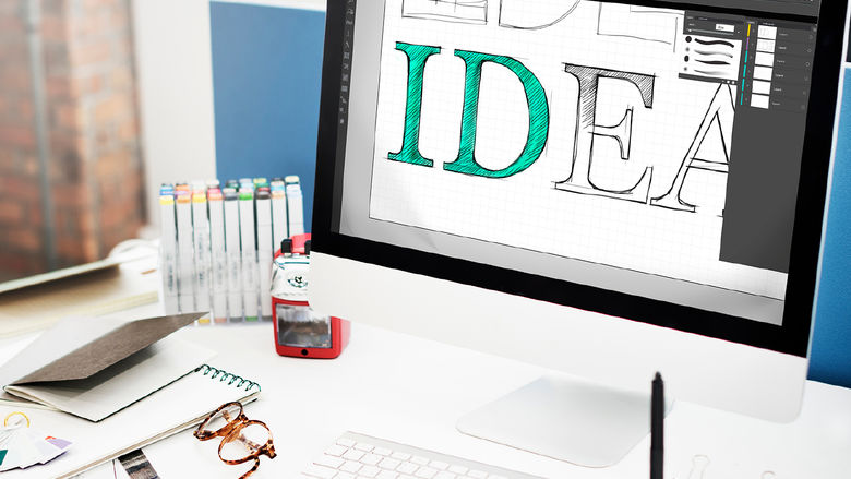 computer screen with a logo design