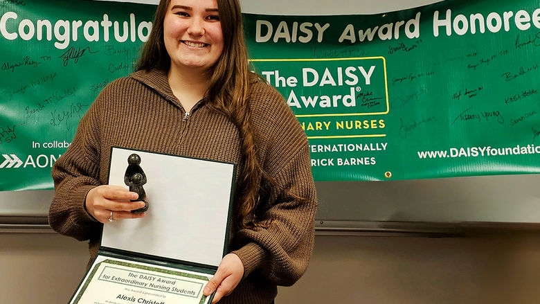 Nursing student Alexis Christoff with her DAISY award