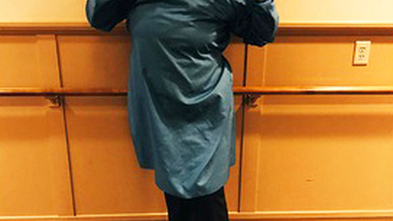 Allyson Givler in mask and scrubs