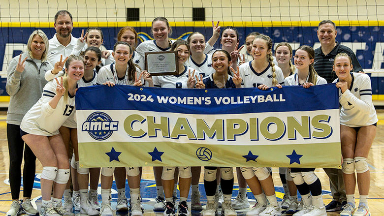 Penn State Altoona women's volleyball team poses for a photo after winning the 2024 AMCC Championship