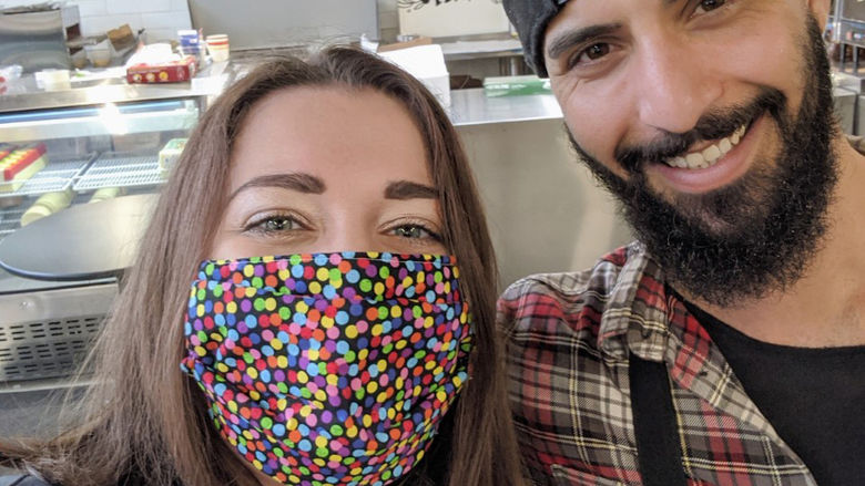 Angela Buccellato with Terry Yatooma, owner of Spread Deli, one of the restaurants that prepared meals for health care workers.