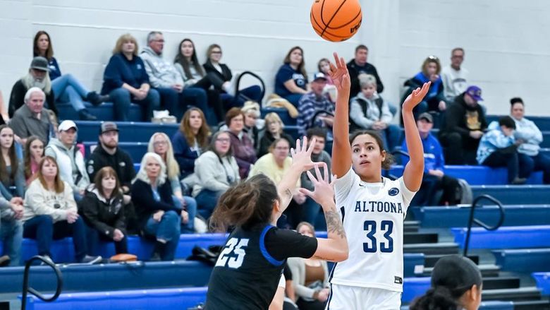 Penn State Altoona student-athlete Avana Sayles playing in a basketball gams