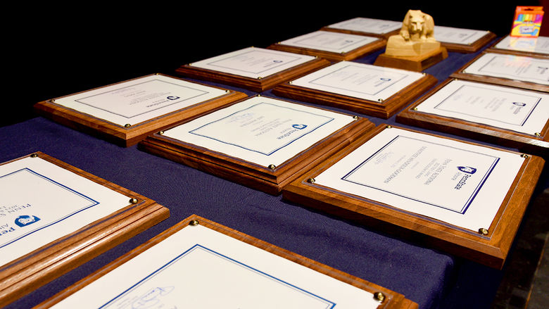 Plaques and trophies from the spring 2023 Penn State Altoona faculty and staff awards