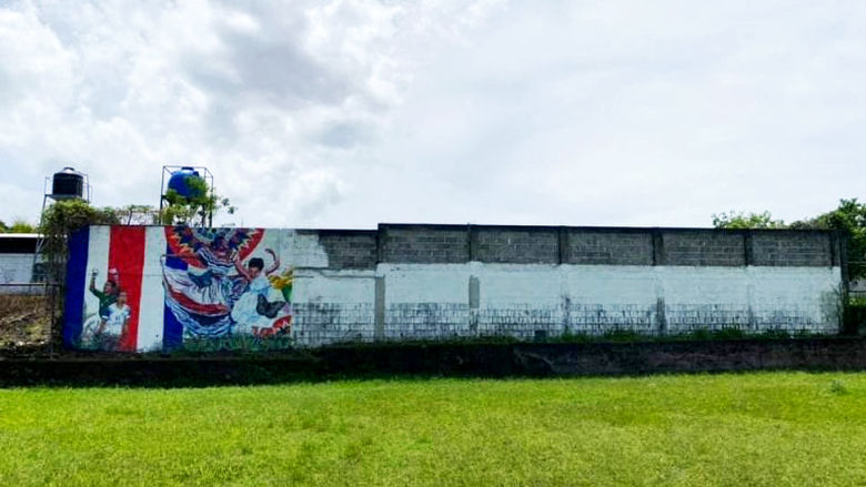 The beginning of a mural located near the Pacifica Fernandez Elementary School in Costa Rica