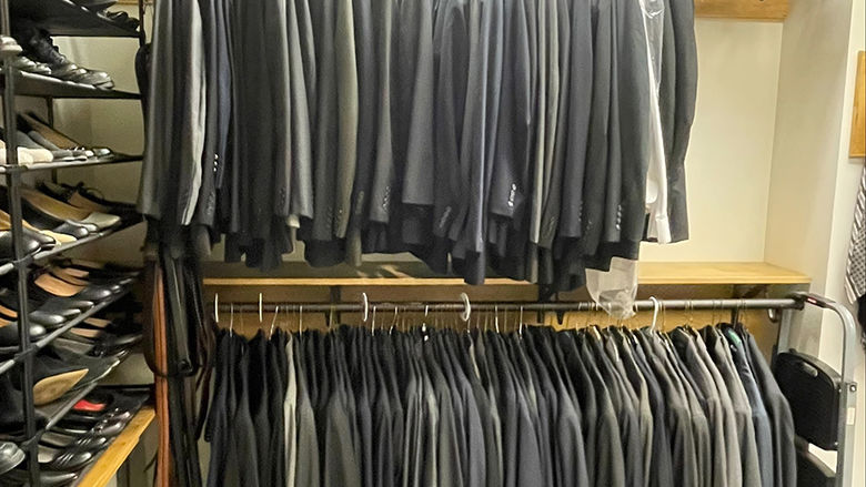 Two racks of suit jackets in the Penn State Altoona Career Closet