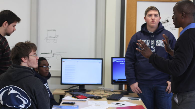 Conrad Tucker interacts with students
