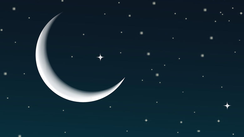 a crescent moon in the night sky
