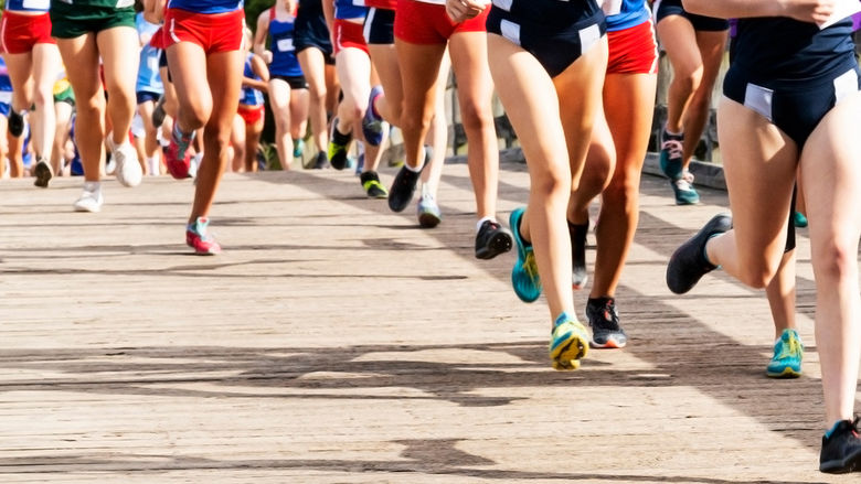 People running in a cross country race