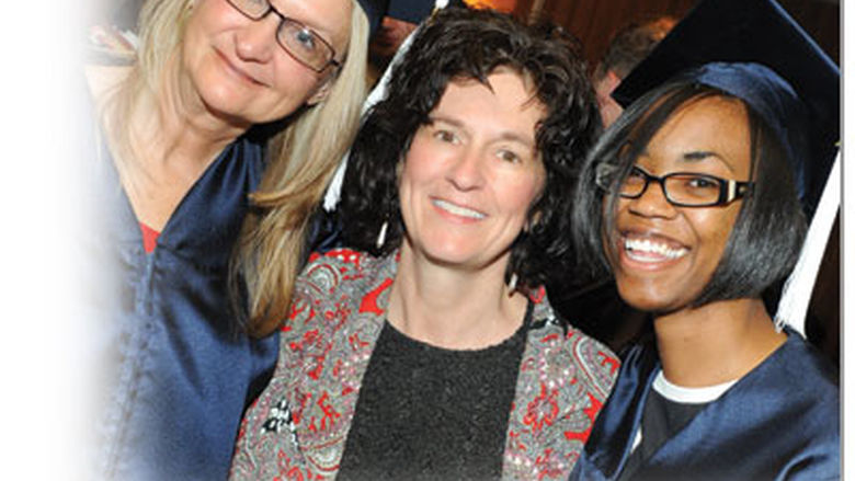 Chancellor and Dean with grads