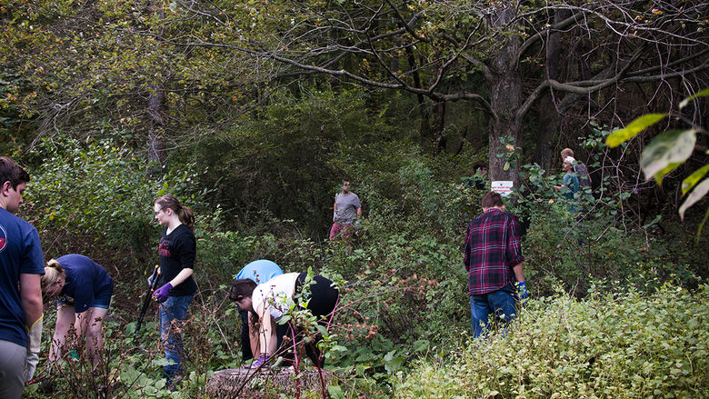 Students study with professor Todd Davis at the Seminar Forest