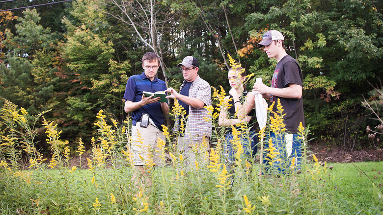 Students study with Professor Carolyn Mahan at the Seminar Forest