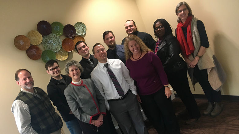 English faculty and students pose at the English Senior Seminar Presentations
