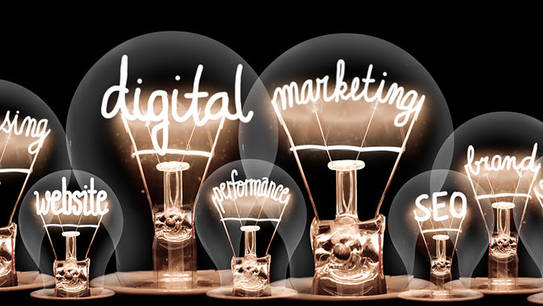 Lightbulbs spelling out terms like digital marketing, websites, etc.