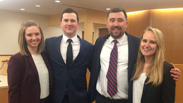 Caitlyn Idoine, Jesse Knowlden '13, Andrew Radin, Ruby Wilz, the four University of Cincinnati law students working on the Ru-El Sailor case at the time of his release from prison.