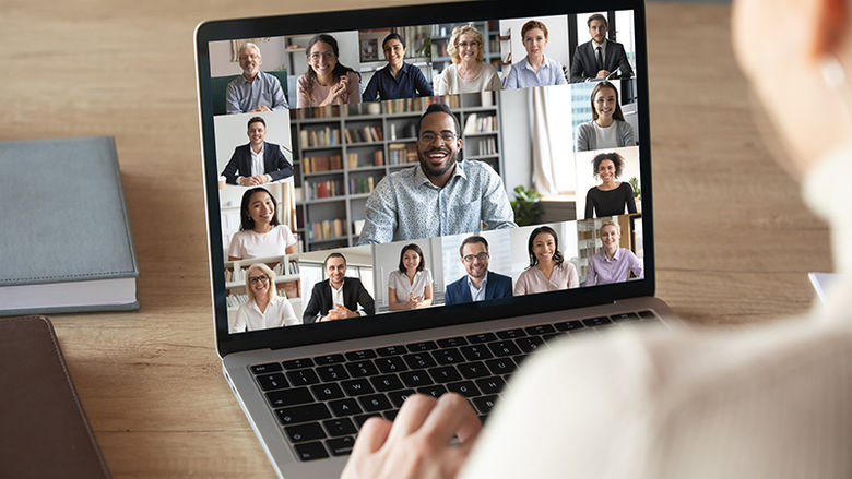A laptop with a Zoom meeting on the screen