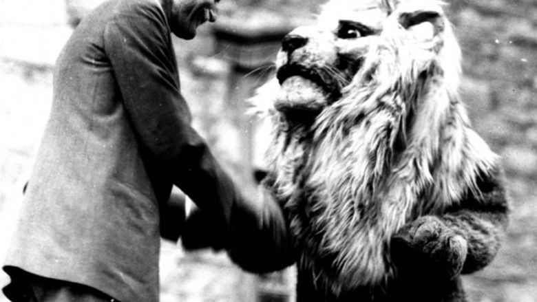 Gov. Gifford Pinchot shakes hands with the Nittany Lion mascot