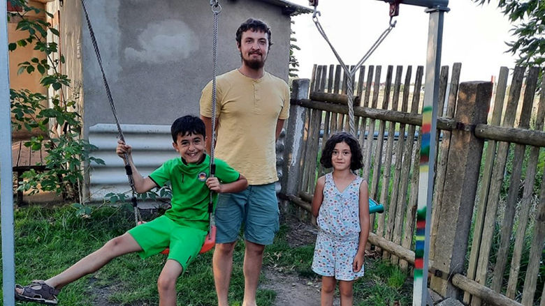 Jacobson spends an evening of laughs, good food, and play with two of his students, Avin and her brother Armaj.