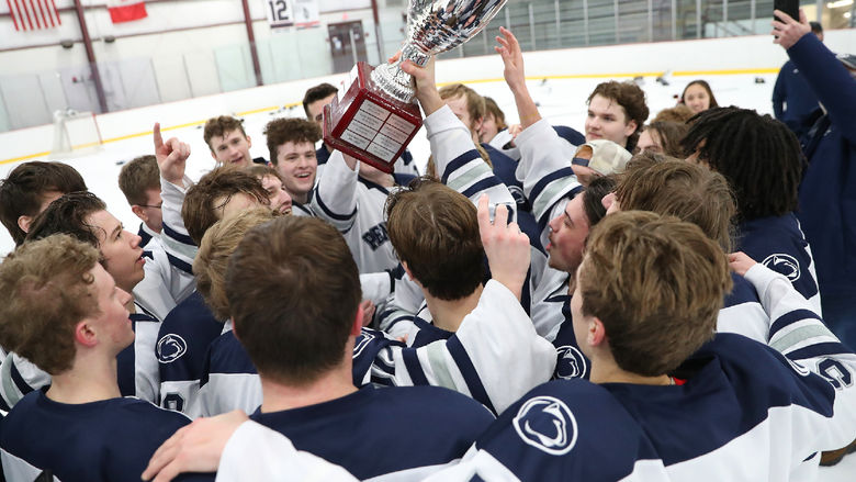 The Penn State Altoona team celebrates their College Hockey East championship win in February. 