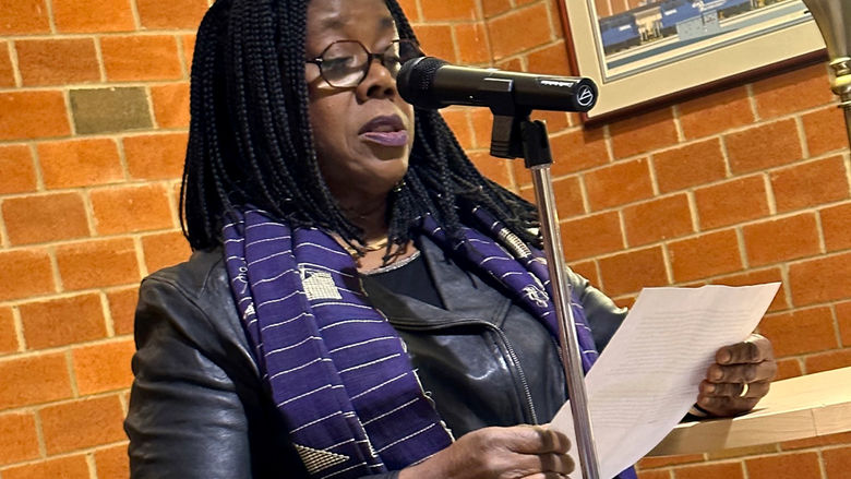 HF Cafe Patricia Jabbeh Wesley, professor of English, introduces featured reader Yaw Agawu-Kakraba, professor of Spanish and African Studies