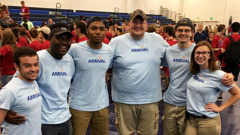 Davidson poses with residence life staff during orientation activities