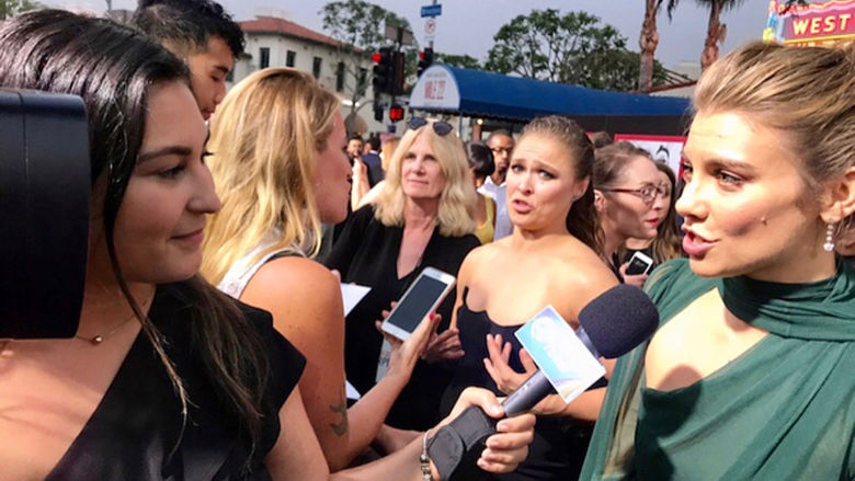 Rivera Chardon interviews celebrities during the Mile 22 premiere for Acceso Total