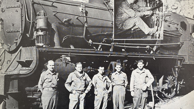This wartime image shows John Halloran (second from right) overseeing military railroad operations in France.