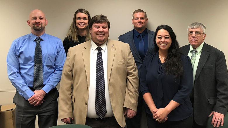 John Hicks (fourth from left) is pictured with some of the people he worked with during his internship at the Blair County Courthouse.