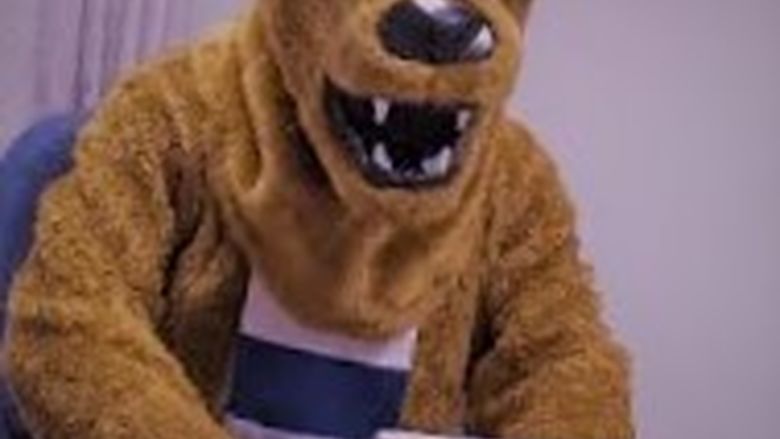 Nittany Lion using laptop