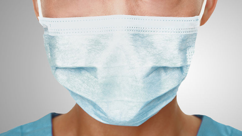 Closeup of a nurse wearing a mask