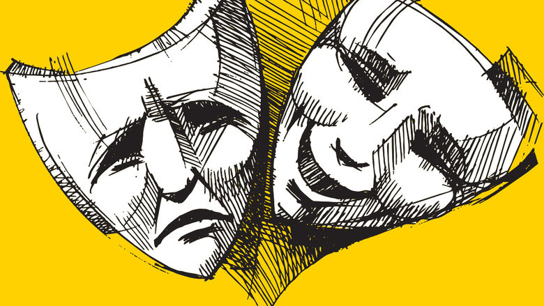 Theatre masks of comedy and tragedy on a yellow background