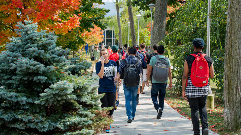 Students walk to and from class on campus