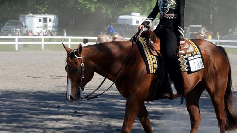 Paige McCabe competes in the Western discipline