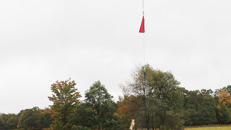EMET students watch as their balloon launches