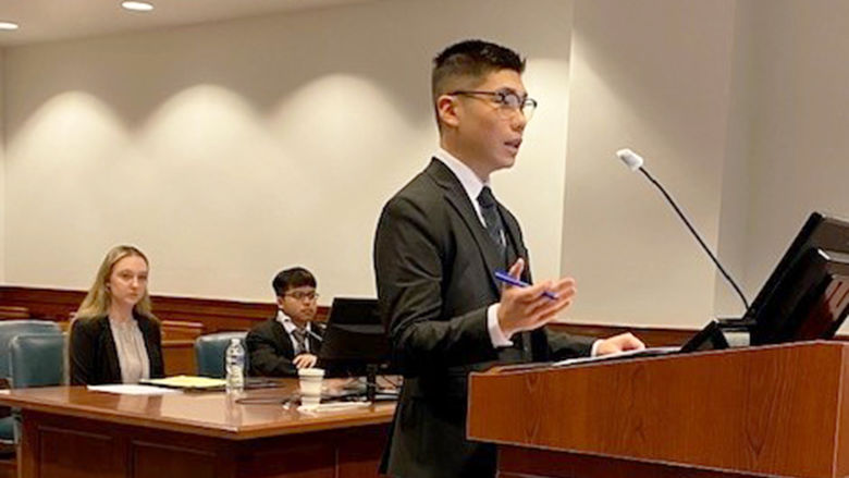 Will Lin (role: “federal prosecutor”) presenting his arguments in front of Judge Haines. 