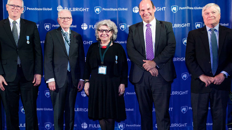 Professor Emerita Roselyn Costantino poses for a photo with Penn State administrators at a celebration of the 75th anniversary of the Fulbright program