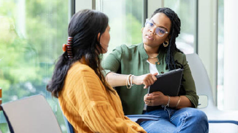 A psychologist talking to a patient