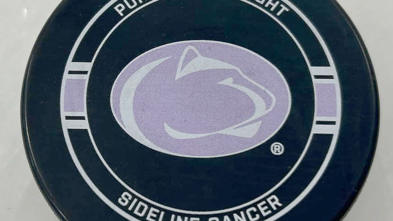 The Purple Puck event’s commemorative game puck.