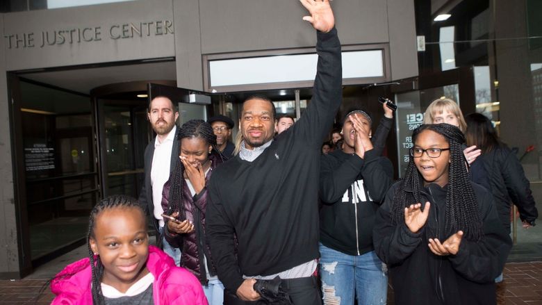 Ru-El Sailor walks out of the Cuyahoga County Courthouse with his family in March after spending 15 years in prison for a murder he did not commit.
