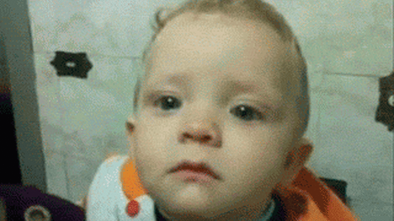 Animated gif of a child frowning