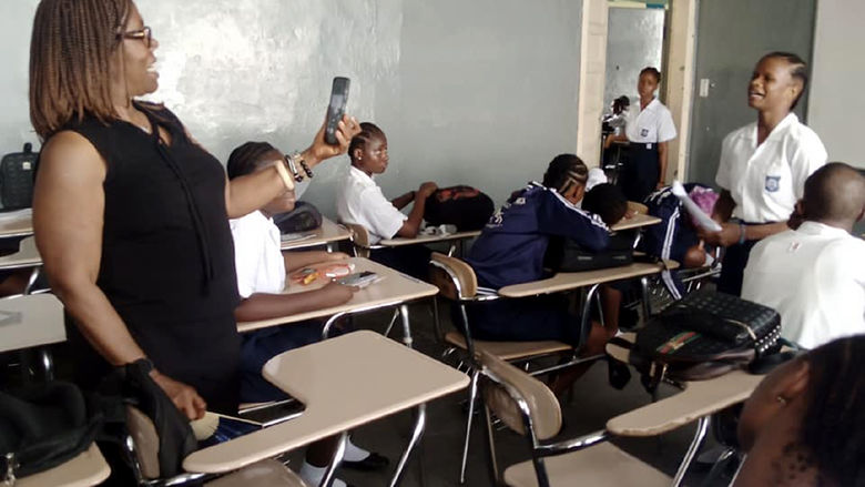 Patricia Jabbeh Wesley conducts a writing workshop at her high school