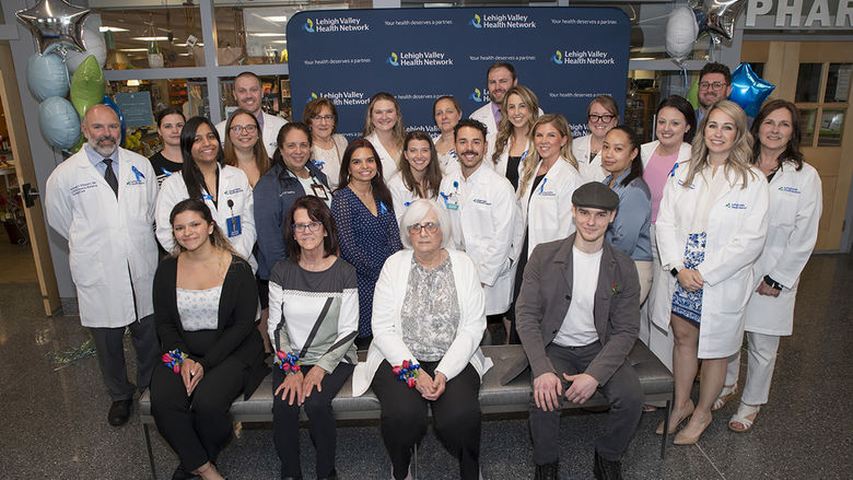 Kim Camacho (L front) with other survivors and their care teams at the Trauma Survivors Ceremony.