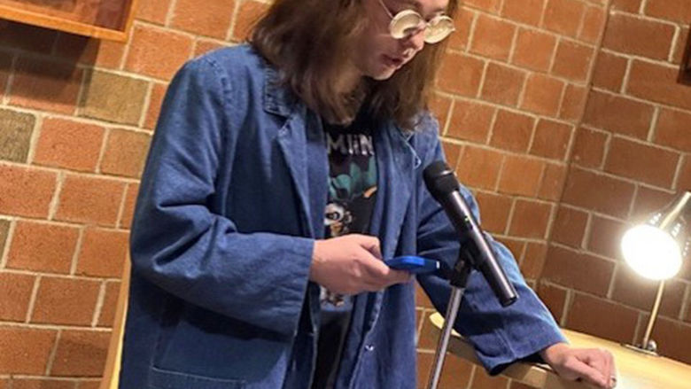 Student Ember Brown reads an original short story.