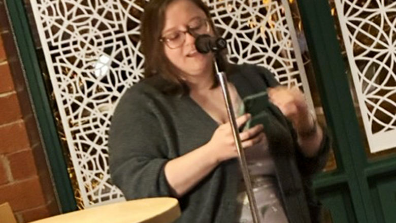 Kylea Myers, Theatre and Gallery Coordinator for the Misciagna Family Center for Performing Arts, reads her original prose.