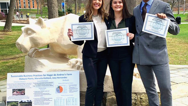 Joey Hernandez poses with partners Marcella Kishlock and Makayla Plants at the annual Undergraduate Research and Creative Activities Fair.