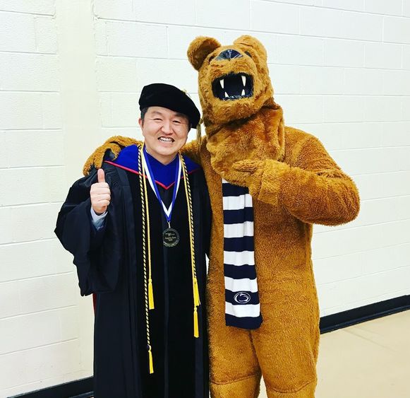 Ryoo with campus Nittany Lion mascot
