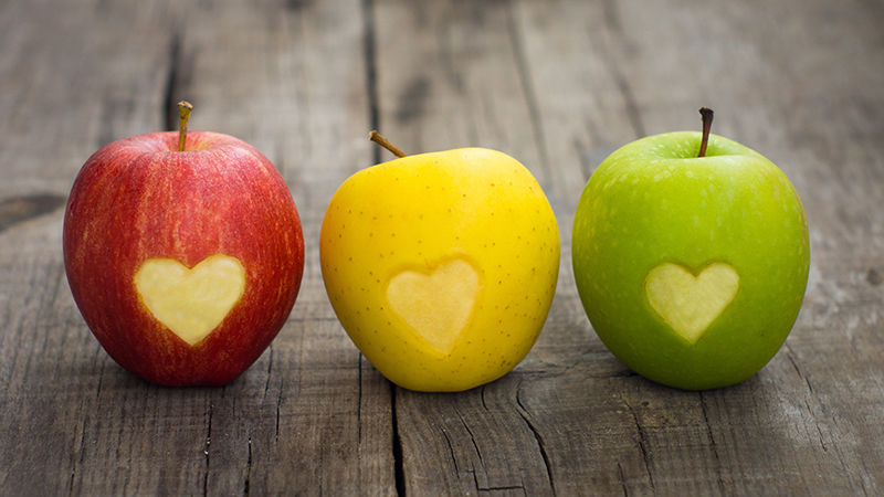 Apples with heart-shaped bites